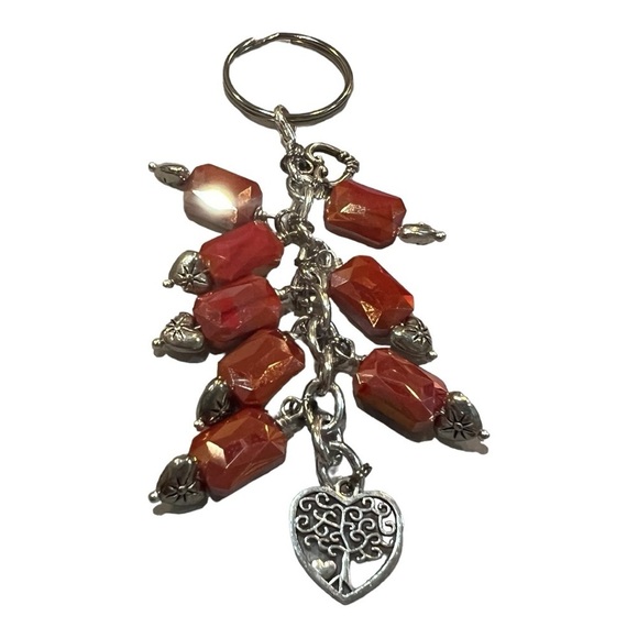 Hand made silver-tone keychain. Iridescent orange/red tone with heart. - Picture 2 of 6